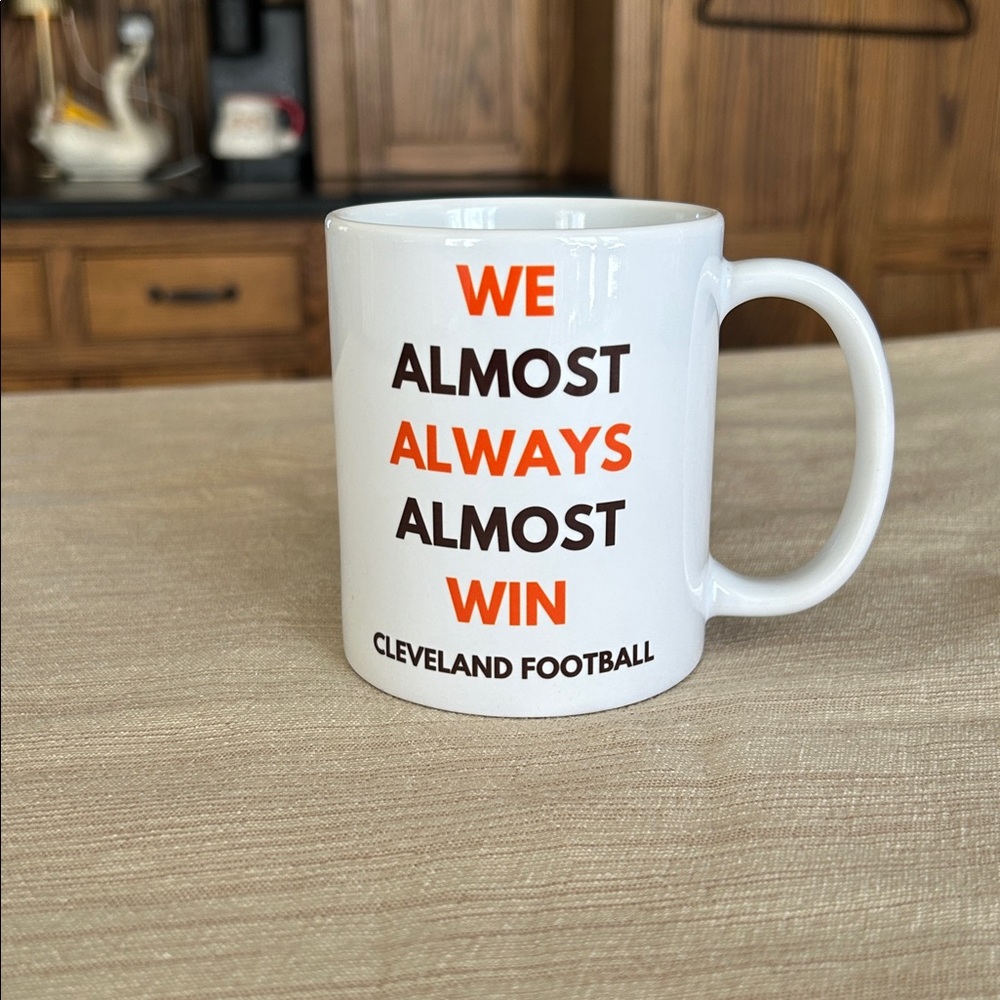 Cleveland Browns NFL Football We Almost Always Almost Win coffee mug dawg pound